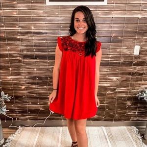 Red dress with embroidery